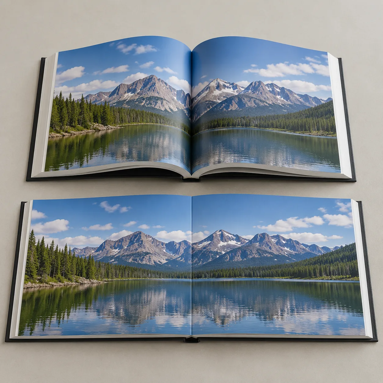 Open hardcover and lay-flat style photo books showing different gutter behavior