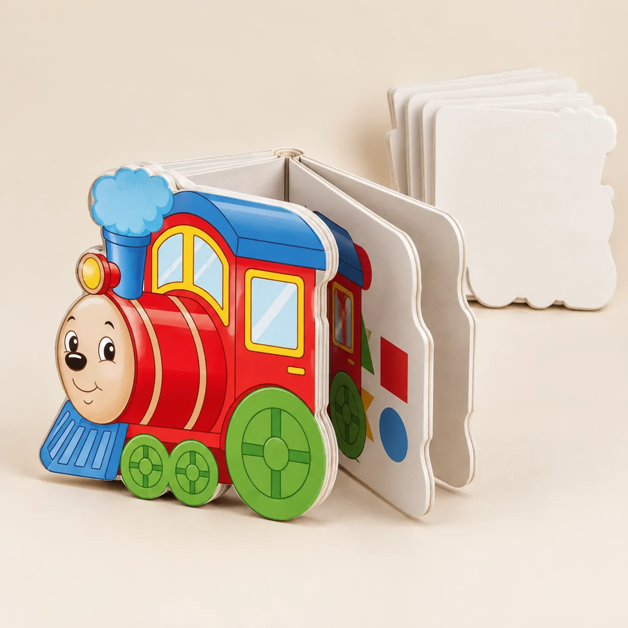 Partly open train-shaped board book showing how its pages align at the binding edge