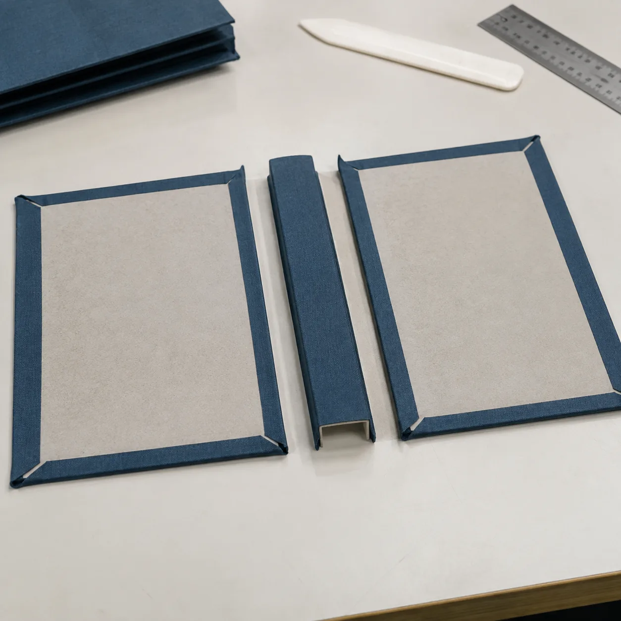 Open hardcover case showing boards, covering material and hinge gaps