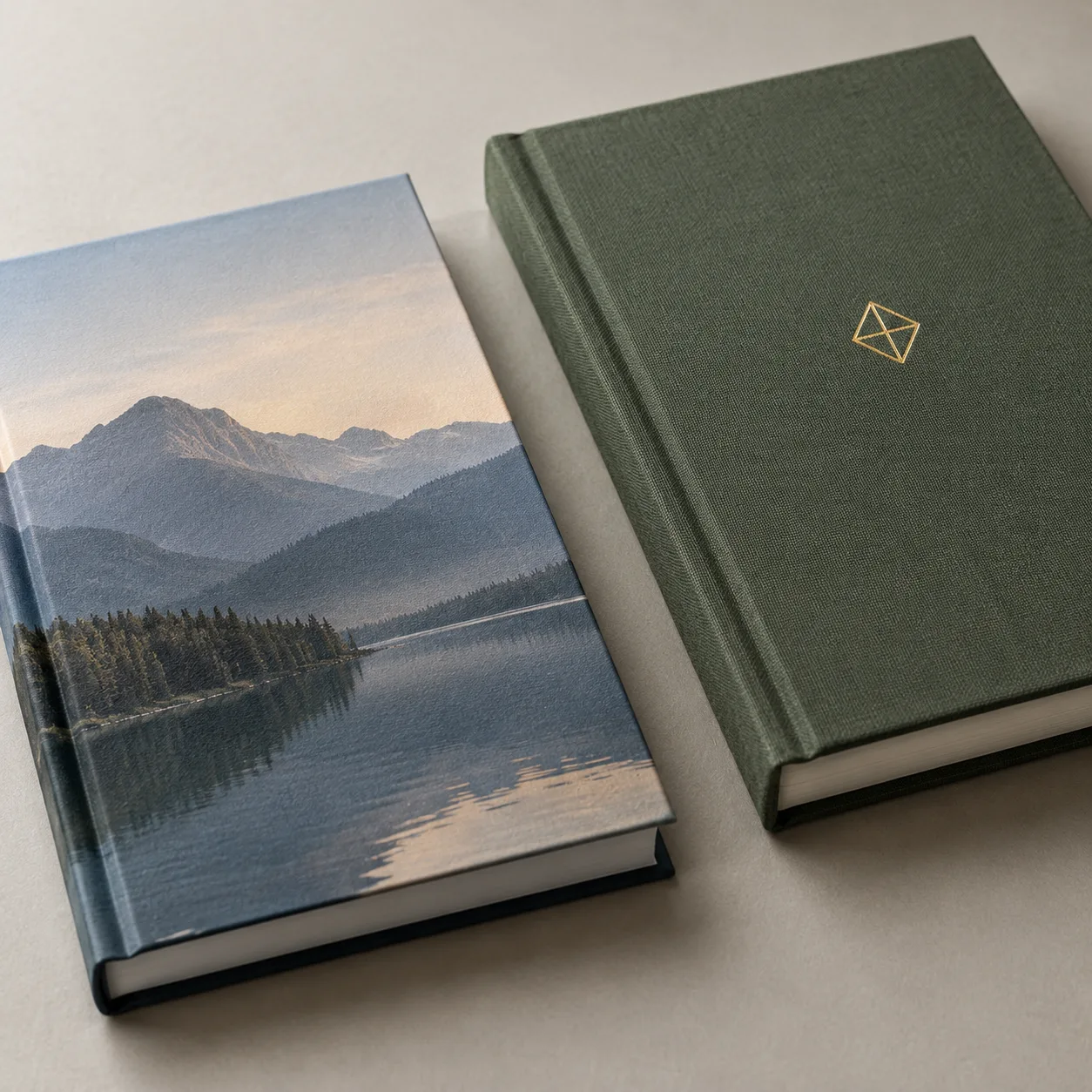 Close-up of matte laminated printed paper and foil-stamped cloth hardcover samples