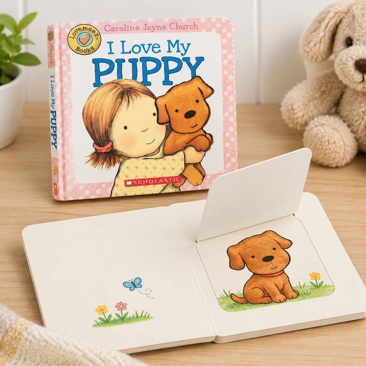 Lift-the-flap board book prototype beside a printed children's board book